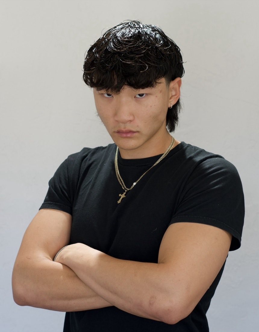 Modern mullet with a textured top at Dino's Barbershop, Normal Heights San Diego